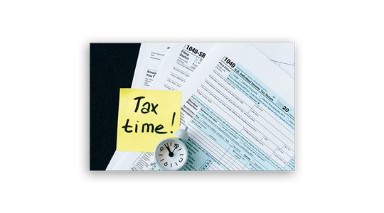 tax papers and mini timer
